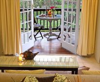 Relax to the sounds of the birds singing in the trees outside. - Stannards Guest Lodge 