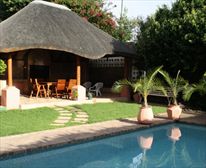 Swimming Pool with barbeque facilities - Miles Guest House