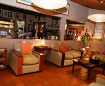 Lounge. - Hog Hollow Country Lodge
