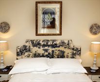 Belvedere Mews Bedroom with double bed - Belvedere Cottages