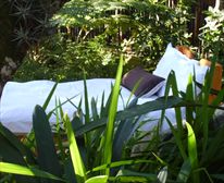 Bed in Garden  - Tranquility Lodge
